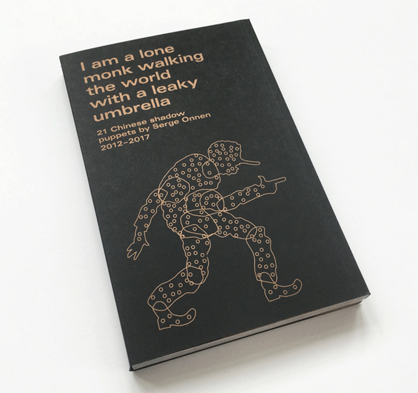 I am a lone monk walking the world with a leaky umbrella 21 Chinese shadow puppets by Serge Onnen book
