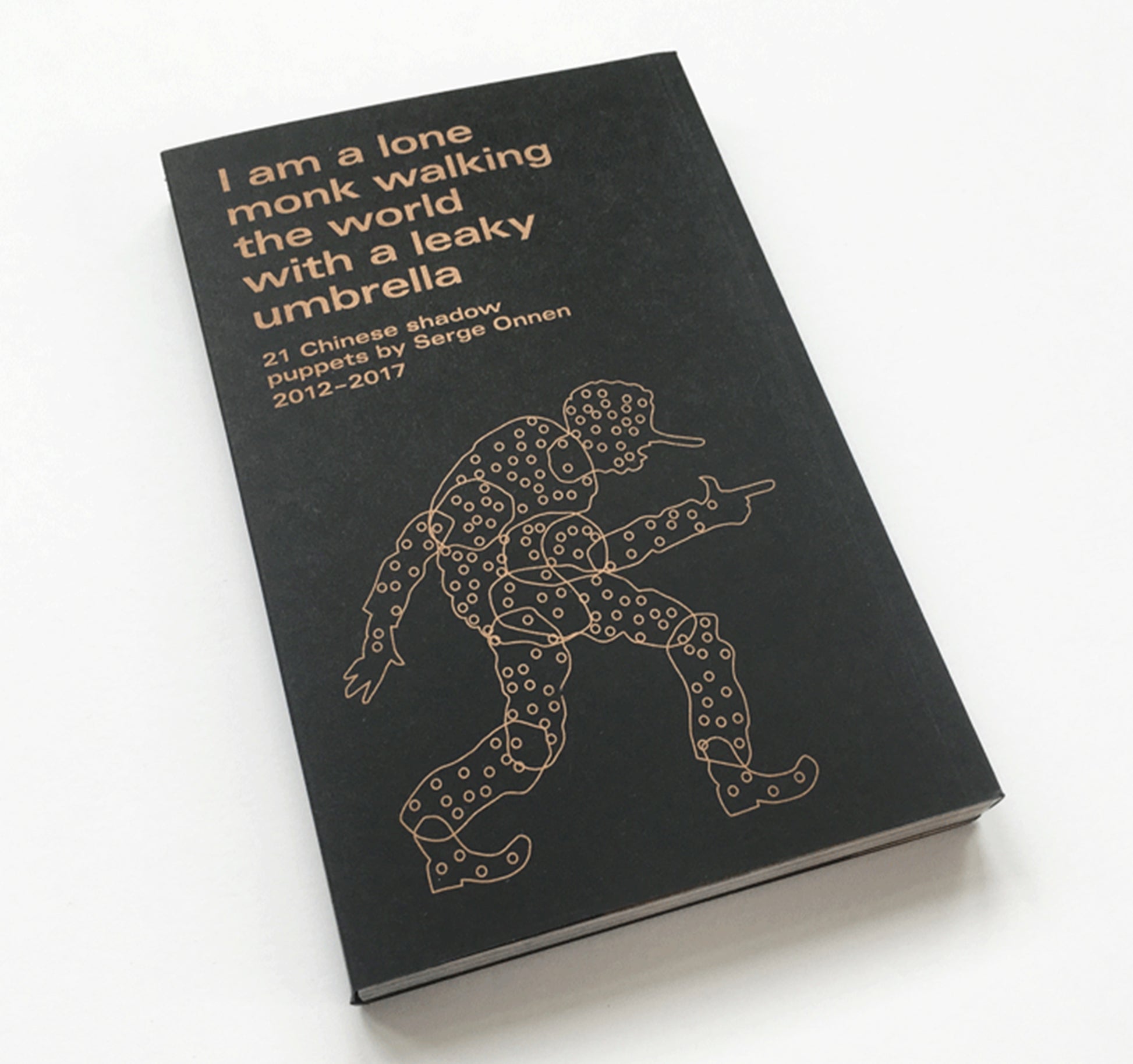 I am a lone monk walking the world with a leaky umbrella 21 Chinese shadow puppets by Serge Onnen book